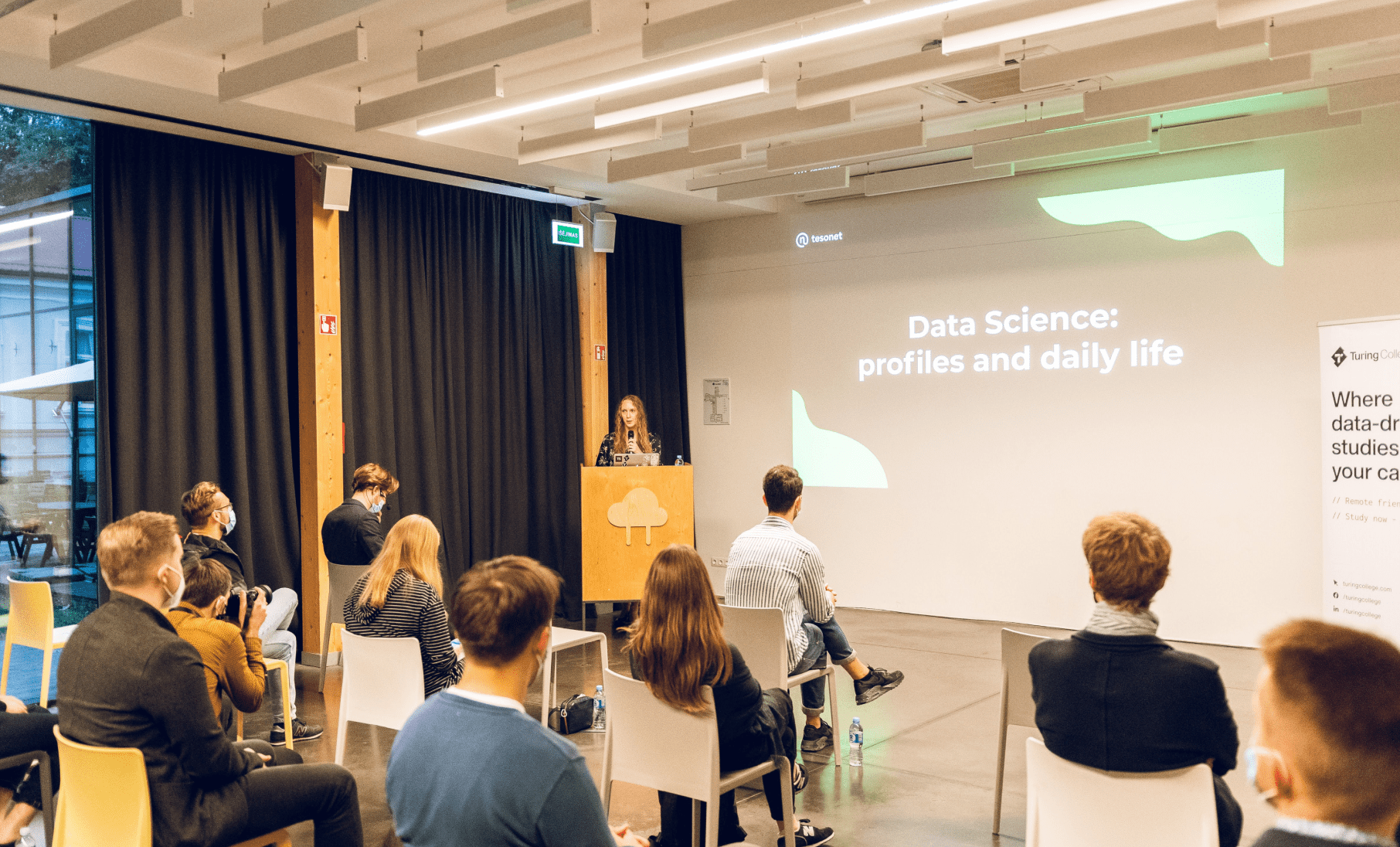 Laura Simutienė giving a talk about data science