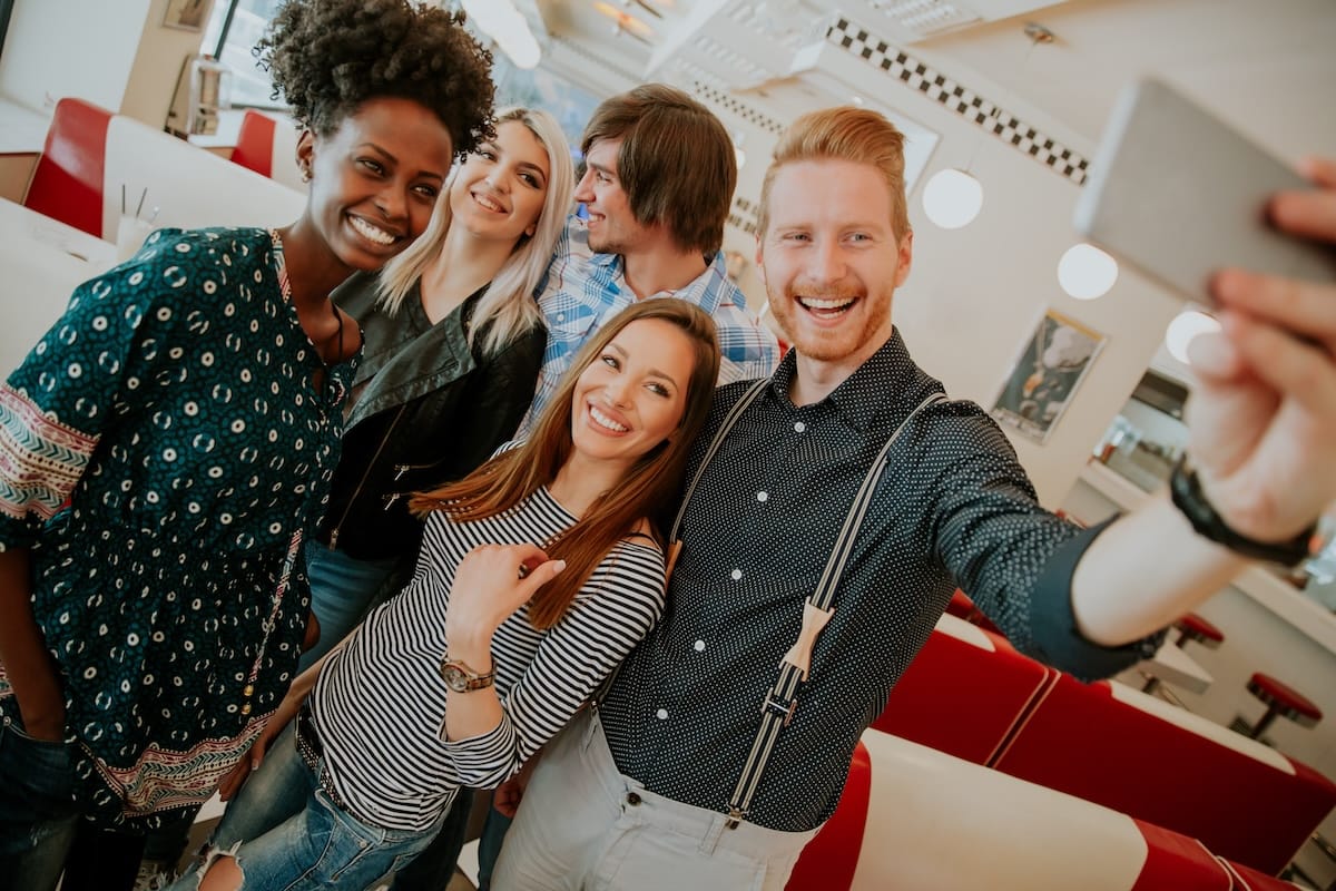 A group of young people taking a selfie