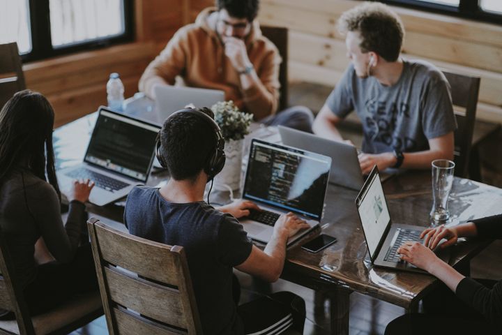 Group of people using laptops